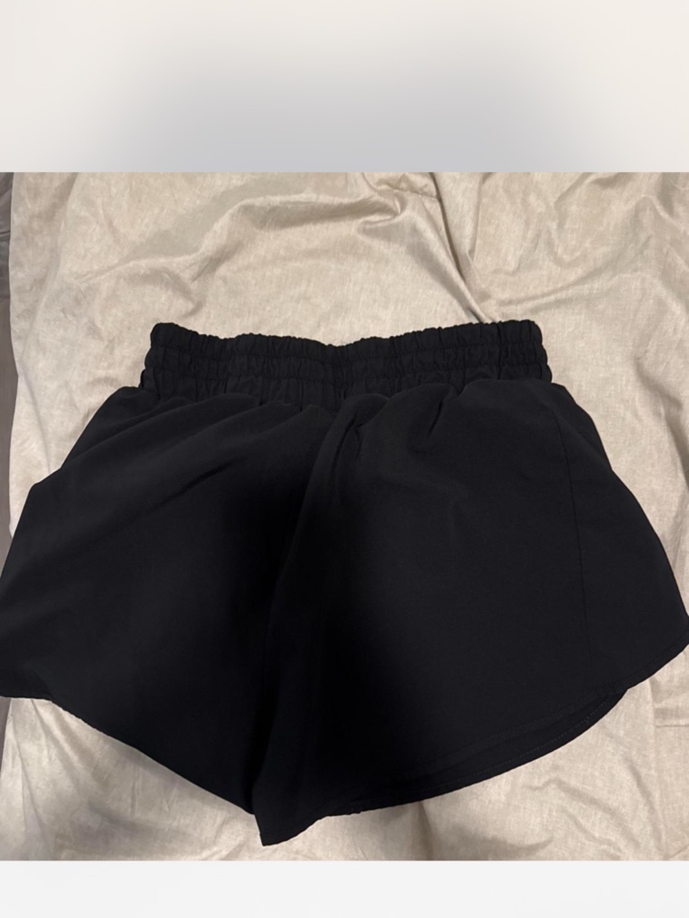Women’s Black Elastic Waist Pull-On Shorts - small hole in inside liner